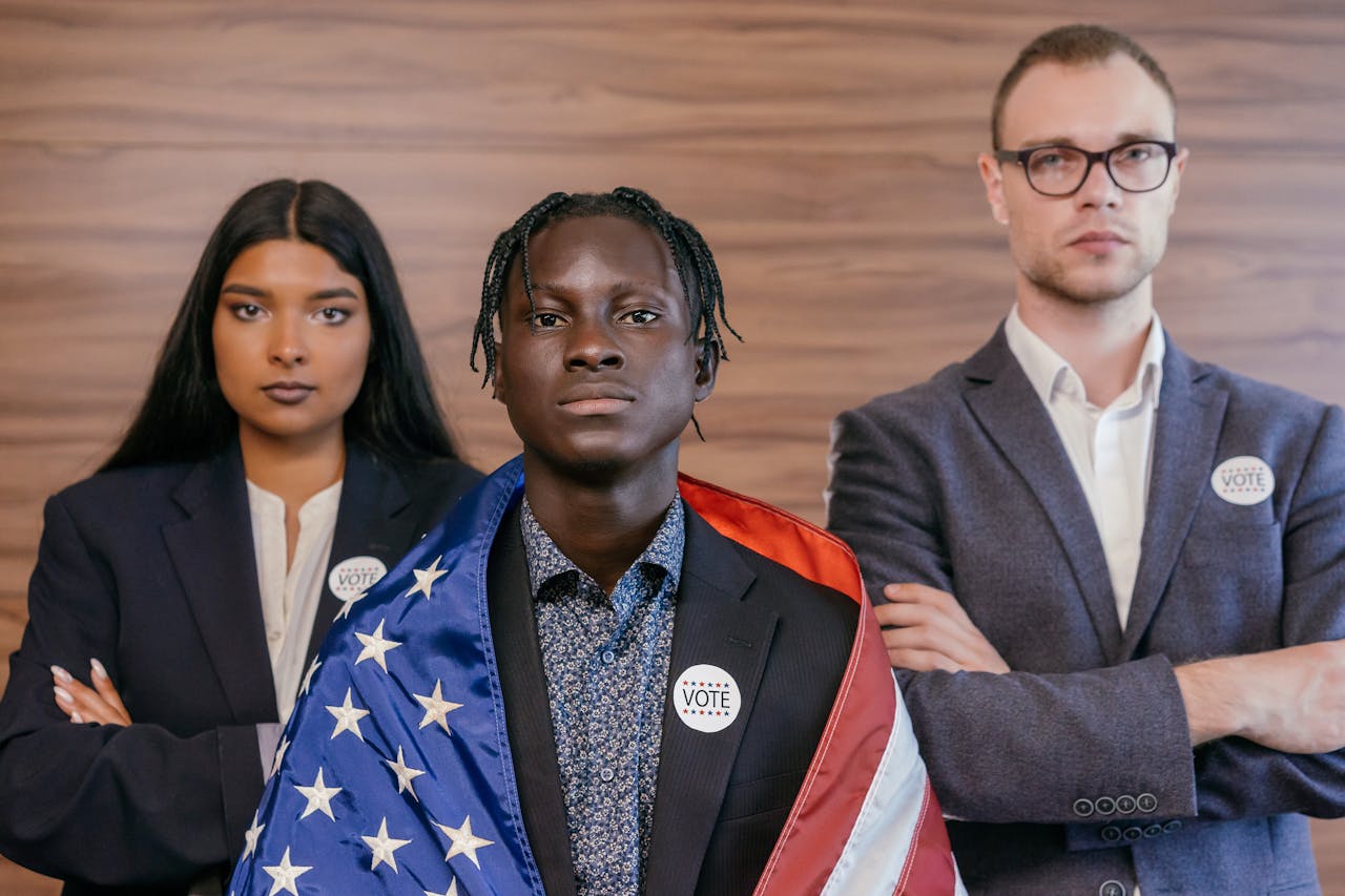 Three professionals with 'Vote' buttons, emphasizing diversity and electoral participation.